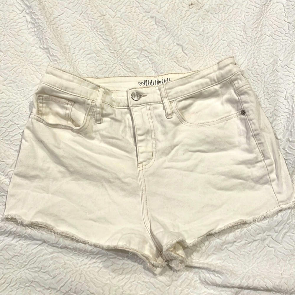 Cream colored short shorts